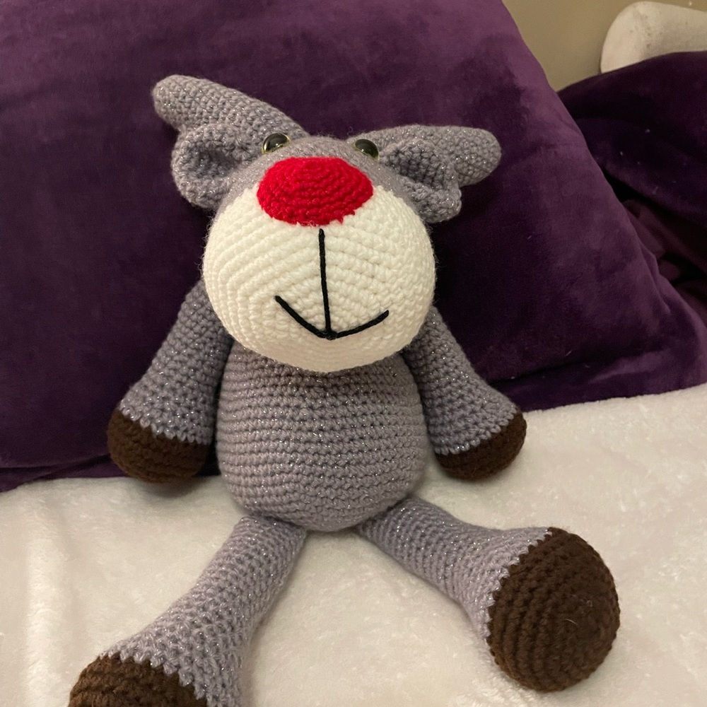 Hand made stuffed reindeer. The deer knitted